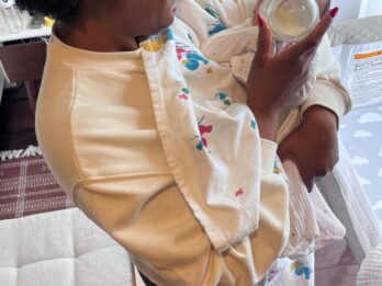 Houston doula supporting laboring mother during Pitocin induction at hospital achieving vaginal birth